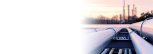steel long pipes in crude oil factory during sunset