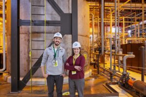 Two people in hard hats