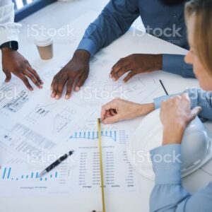 Collaboration, planning and hands of architect with blueprint documents working on house, home or shopping mall building design. Teamwork, architecture and construction strategy meeting for team plan