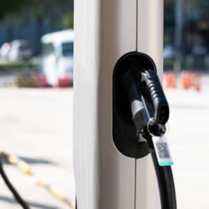 Electric vehicle charging station on city street