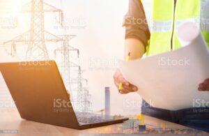 Double exposure of Engineer working in control electrical room