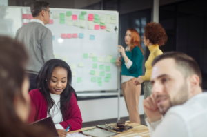 Image of new graduates at work
